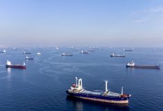 Commercial vessels  &#8211;including vessels which are part of the Black Sea grain deal &#8212; wait to pass the Bosphorus strait off the shores of Yenikapi during a misty morning in Istanbul, Turkey on Oct. 31, 2022. (Photo: Reuters/Umit Bektas)
