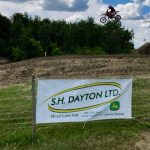 S.H. Dayton sponsorship signage at a 2018 motocross event. (S.H. Dayton Ltd. via Twitter)