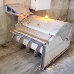 One producer uses this automatic robot feed-pusher to keep feed in front of his dairy cows. It is is programmed to move along the feed-bunk, where it then augers newly dumped feed, remixes it and pushes it up, every 2 1⁄2 hours.