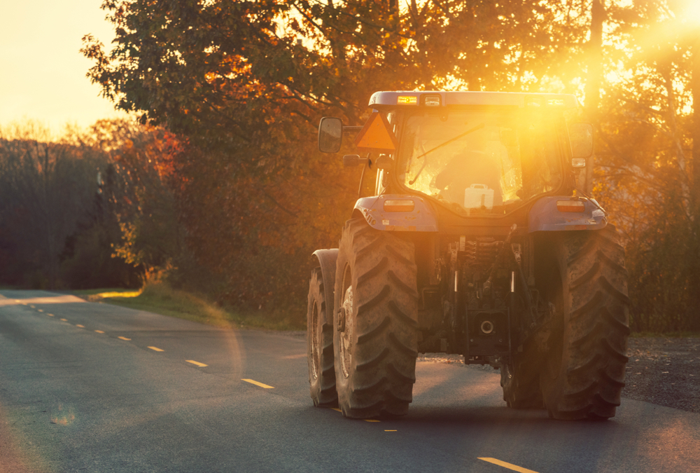 tractor driving on a road