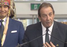 Ron Kostyshyn is sworn in on Oct. 18, 2023 as Manitoba&#8217;s minister for agriculture, with Premier Wab Kinew at left. (Government of Manitoba video screengrab via YouTube)
