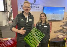 Marcel Kringe, founder and CEO and Courtney Baxter, global marketing manager, with Bushel Plus show one of the combine concaves they are marketing at Agritechnica.  Photo: John Greig