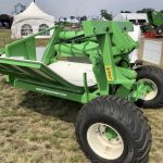A new model of the trailer-style Hustler bale processor on display at the 2023 Ag In Motion Show. The processor comes in various sizes from single bale up to six and eight bale capacity. The single bale processor can attach to the tractor with a patented snap-lock system as well as trailer style.