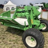 A new model of the trailer-style Hustler bale processor on display at the 2023 Ag In Motion Show. The processor comes in various sizes from single bale up to six and eight bale capacity. The single bale processor can attach to the tractor with a patented snap-lock system as well as trailer style.