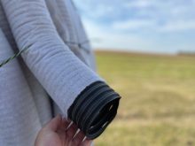 Tile drains are perforated plastic pipes installed below the crop rooting zone, used to reduce the depth of shallow water tables in imperfectly and poorly drained areas of a field. This pipe has a filter sock to prevent sediment from getting into the tile system.