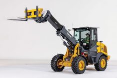 The new 326 P-Tier compact wheel loader from John Deere includes an extendable boom that can reach up to 16 feet.