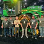 farmers at deere manufacturing plant