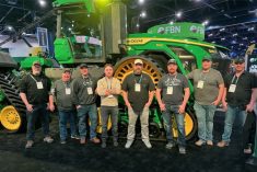 farmers at deere manufacturing plant