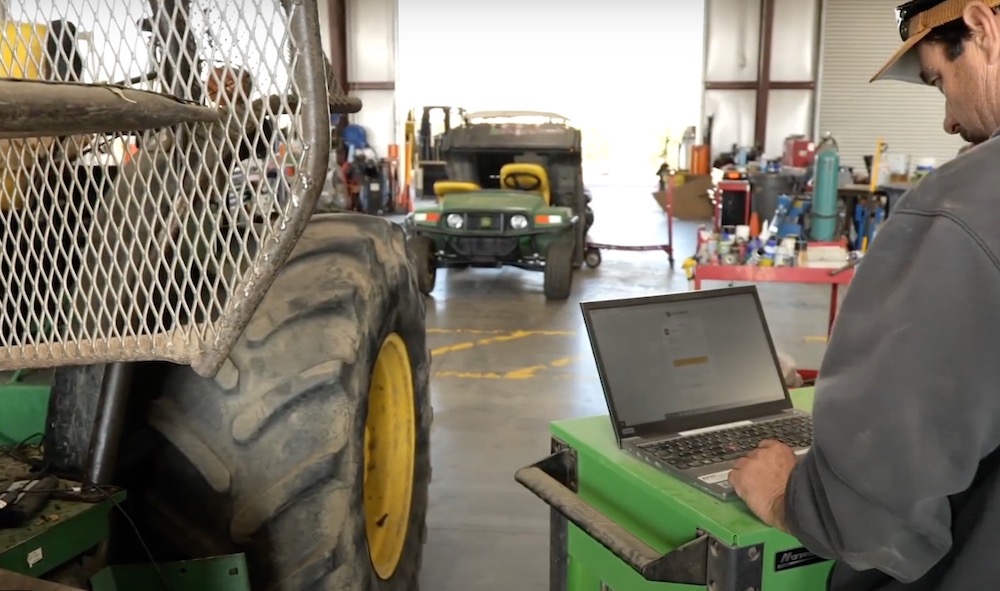 farm mechanic with deere equipment
