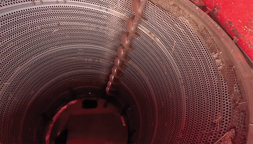 the 66-inch diameter drum and stripper auger of the Roto Thresh combine