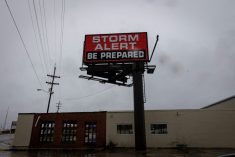A billboard is seen as Hurricane Francine approaches the U.S. Gulf Coast, in Morgan City, Louisiana, U.S. September 11, 2024.  REUTERS/Marco Bello
