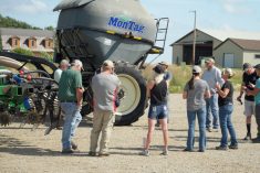 TAP program participants at a recent event at Enderlin, N.D., west of Fargo, check out a Montag fertilizer application unit, designed for use in reduced-tillage and cover cropping systems.