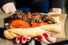 File photo of a steak sandwich with chimichurri sauce at a street food market in Buenos Aires. (Aleksandr_Vorobev/iStock/Getty Images)