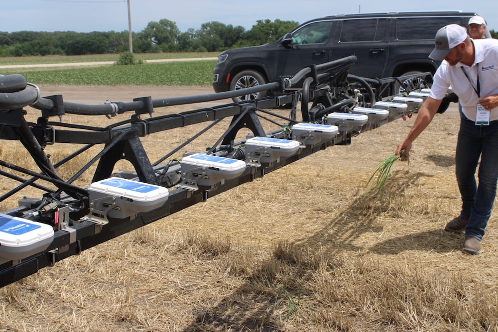 Justin Prickel demonstrates the WeedSeeker 2 system’s ability to detect a weed during Agco’s 2024 Tech Day event near Salina, Kansas in June. PTx Trimble is now part of a joint venture between Trimble and Agco.