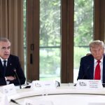 FILE PHOTO: U.S. President Donald Trump and Canadian Prime Minister Mark Carney attend a meeting with G7 leaders and guests, at the G7 summit in Kananaskis, Alberta, Canada, June 16, 2025. REUTERS/Kevin Lamarque/File Photo