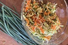 grated zucchini, carrot and other ingredients for vegetable fritters