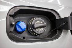 Tank filler neck for AdBlue and Diesel fuel close-up. Adblue diesel exhaust fluid fuel tank cap. Close up Adblue Diesel exhaust fluid DEF and fuel tank cap. Photo: Dmitry Presnyakov/iStock/Getty Images