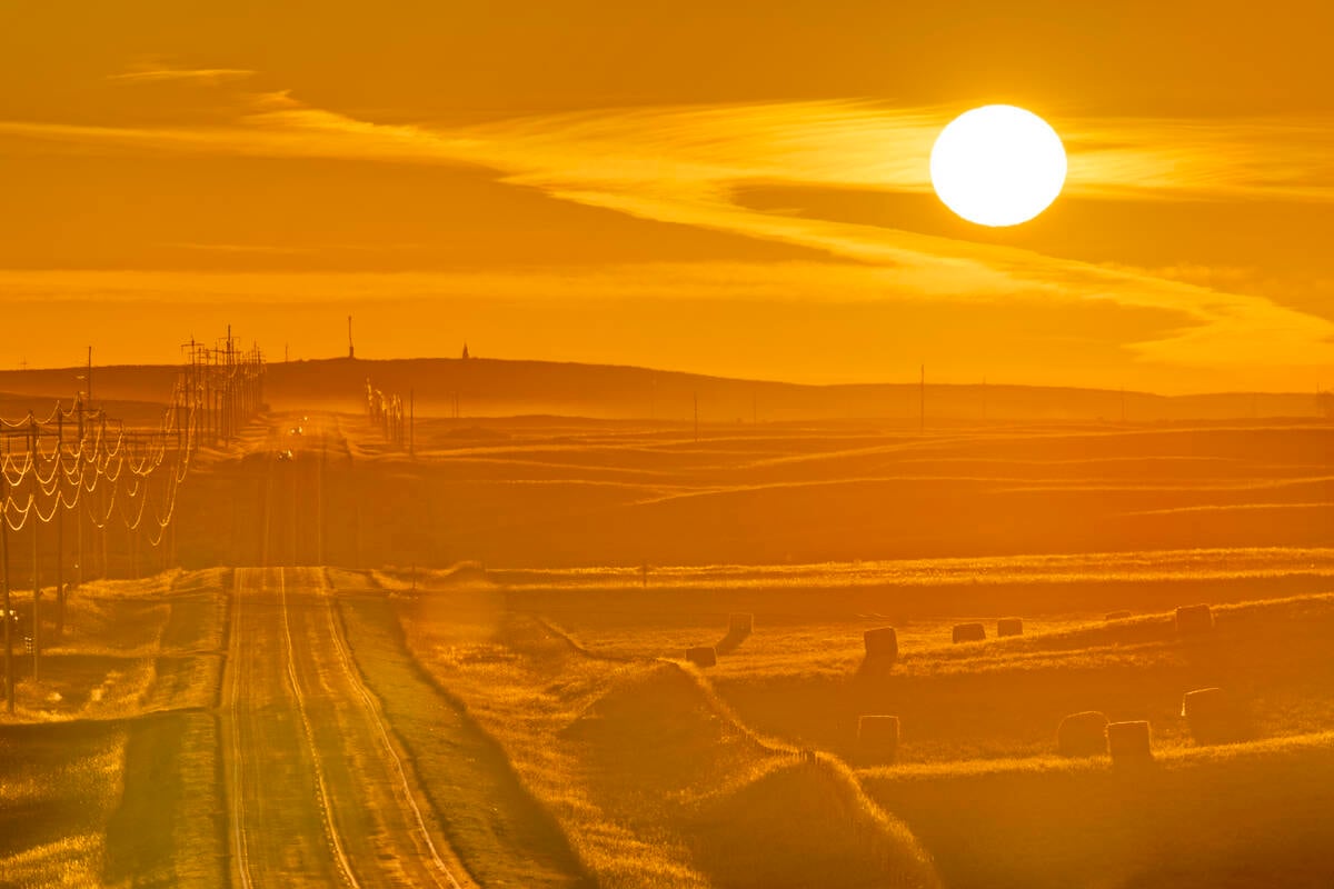 Rural highway at sunrise with dramatic clouds in Southern Alberta Canada. Pic: Don White/iStock/Getty Images