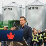 Conservative leader Pierre Poilievre addresses electric vehicles and China’s recent tariffs against Canadian canola seed at a press event on a Saskatchewan grain farm Aug. 14, 2025. Photo: Janelle Rudolph
