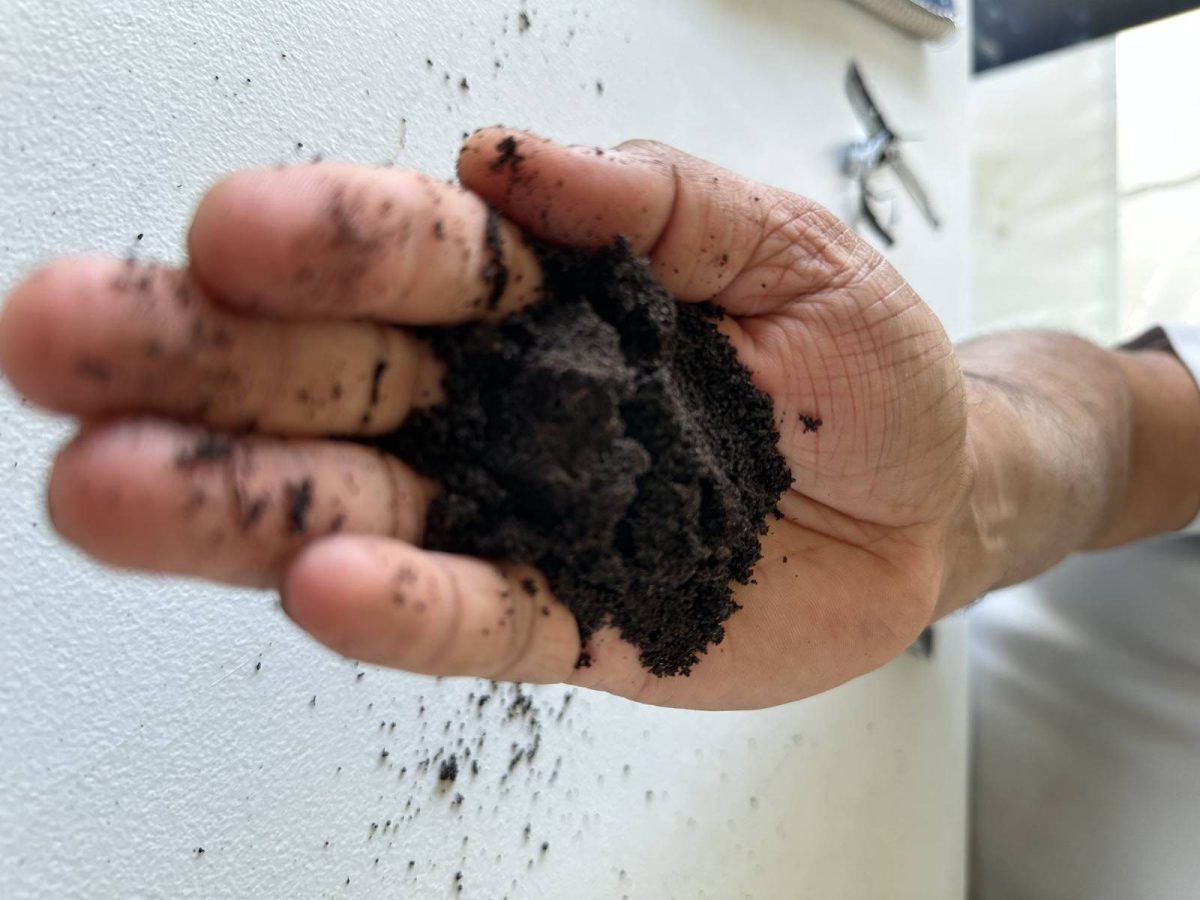 Karthikeyan Narayanan shows off earthworm castings - an amendment offered by Annelida, one of the companies that Cropland Analytics partners with. The castings are meant to add structure to the soil. PHOTO: Don Norman