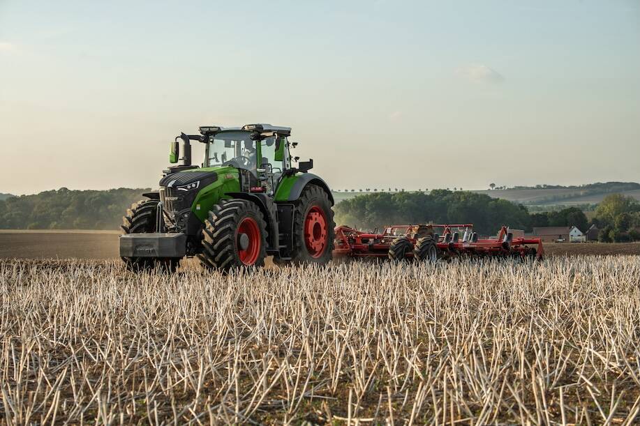 fendt tractor towing implement in field