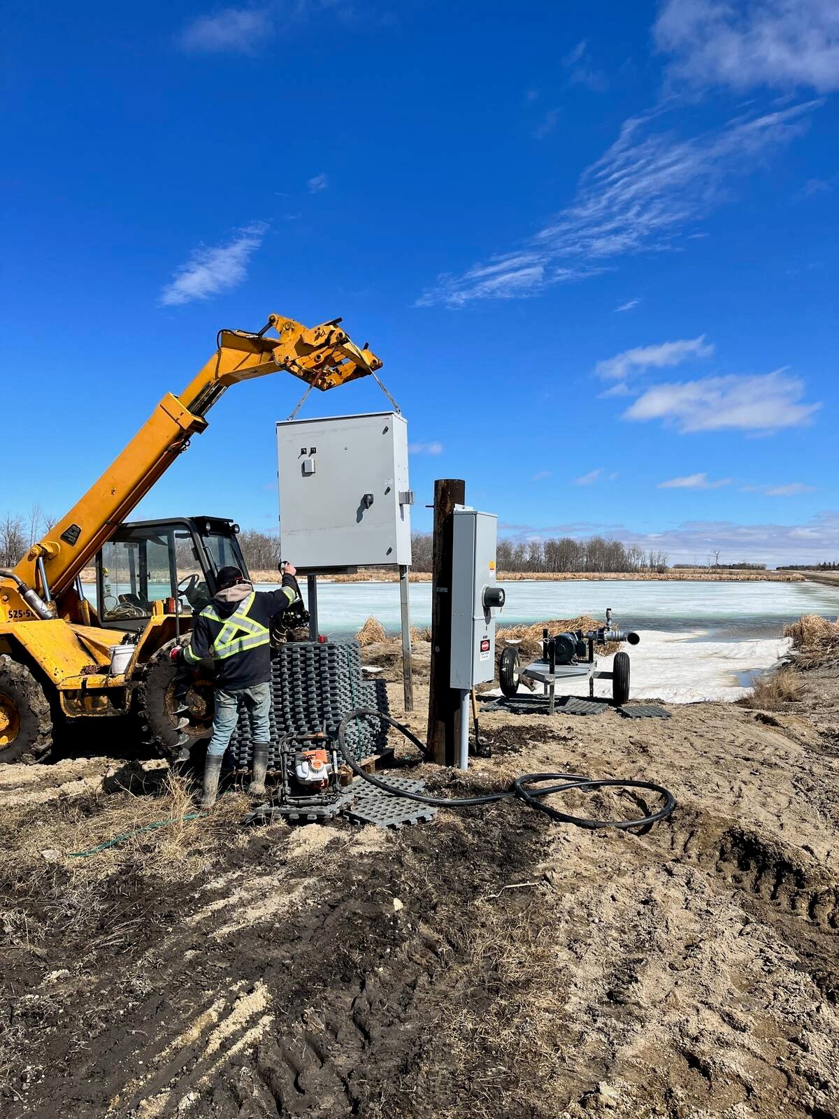 Installing infrastructure for the Gray farm consolidation drainage project. PHOTO: Aaron Gray