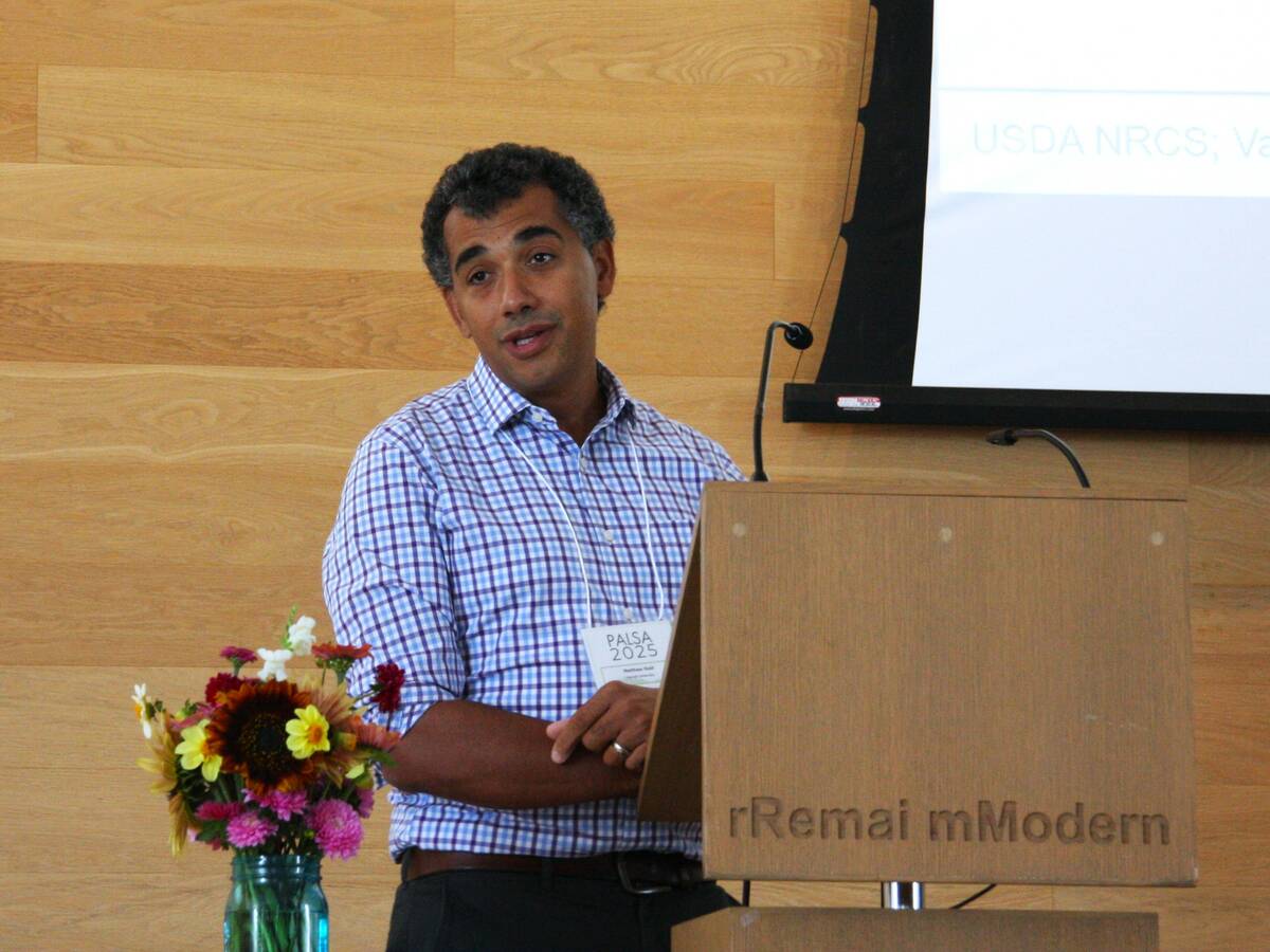 Matthew Reid of Cornell University presents his work on tile drainage at the 2025 Pan-American Light Sources for Agriculture Conference in Saskatoon. Photo: Janelle Rudolph