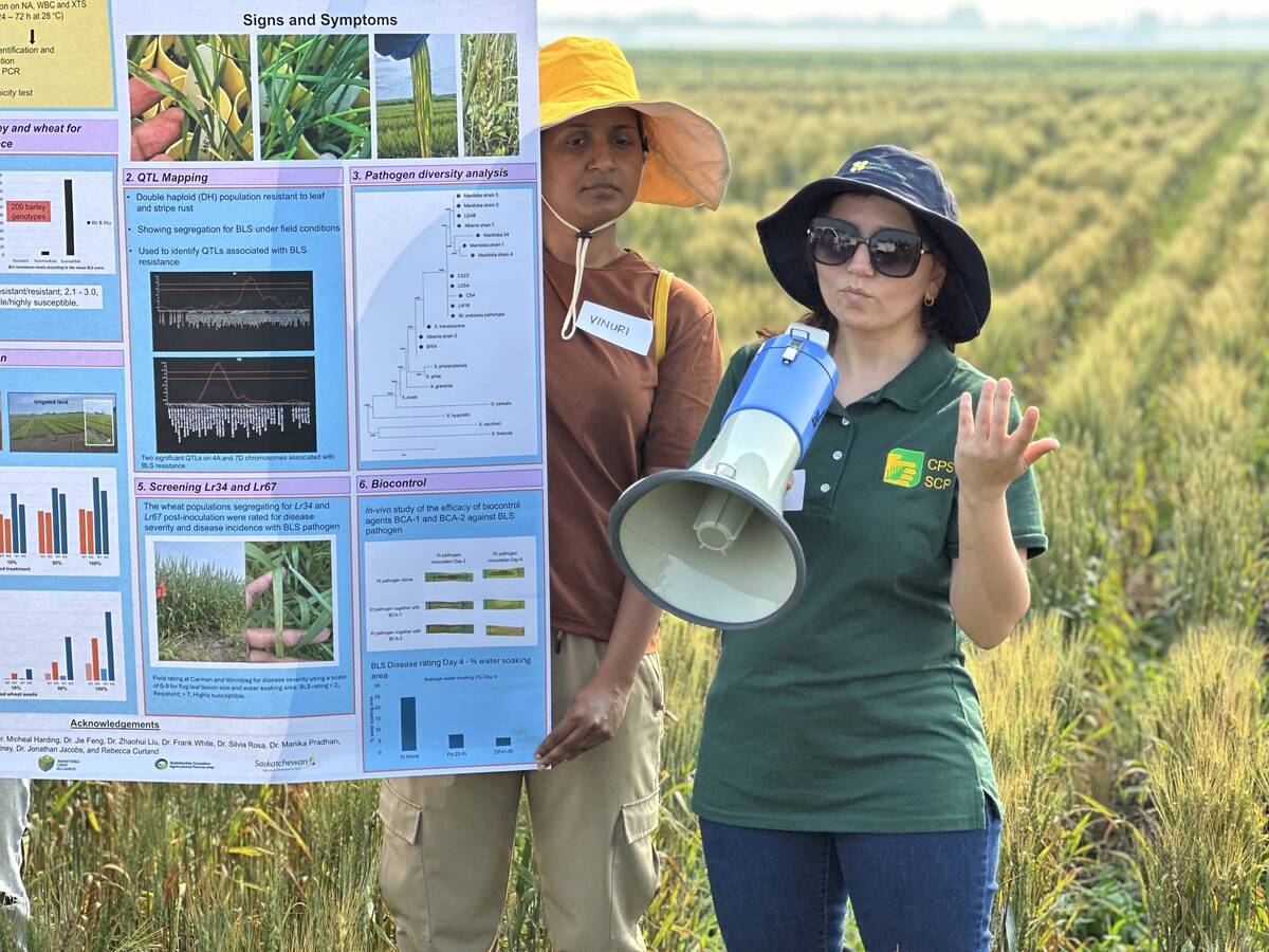 University of Manitoba researcher, Shaheen Bibi discussing her BLS field trials at a field day in Carman, Man.