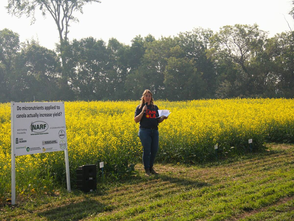 Kaeley Kindrachuk of SaskOilseeds talks about her micronutrient study during a Northeast Agriculture Reseach Foundation field day near Melfort, Sask. Photo: Janelle Rudolph