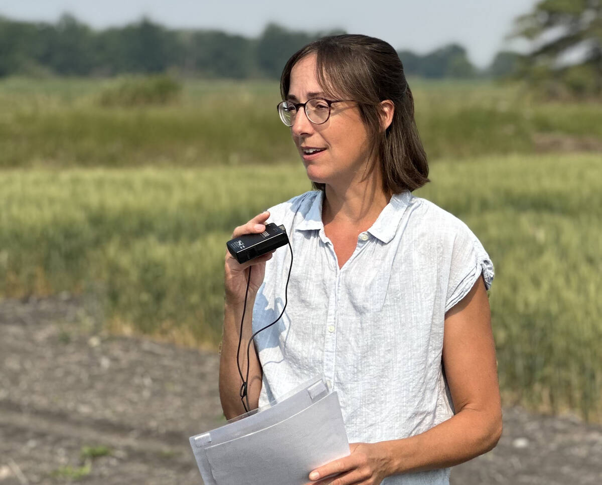 Manitoba Agriculture cereals specialist Anne Kirk speaks during a field tour in Arborg on July 30. Kirk’s work exploring how cover crops affect Prairie cropping systems highlights the role soil moisture plays in canola establishment. Photo: Don Norman
