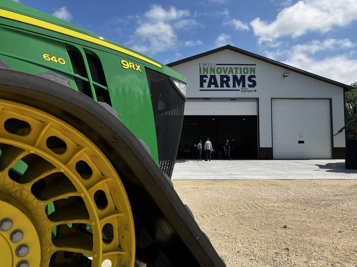 The nose of a John Deere tractor on the grounds at EMILI Innovation Farms near Grosse Isle, Manitoba, on August 6, 2025.  Photo: Greg Berg (note: select vertical option included if it works better for print)