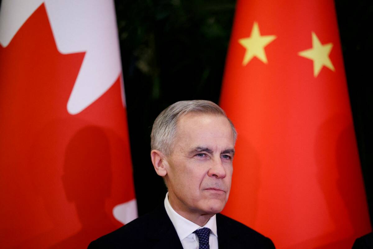 Mark Carney looks on as he meets the chairman of the standing committee of the National People’s Congress of China Zhao Leji (not pictured), during the first visit by a Canadian prime minister to China since 2017, at the Great Hall of the People, in Beijing on Jan. 15, 2026. Photo: REUTERS/Carlos Osorio
