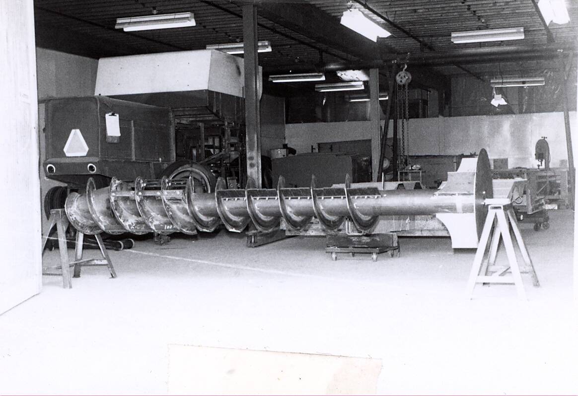The thresher, separator and auger assembly of the R2A prototype, which was also built on the chassis of a conventional Cockshutt 535 and field tested in the 1968 growing season.