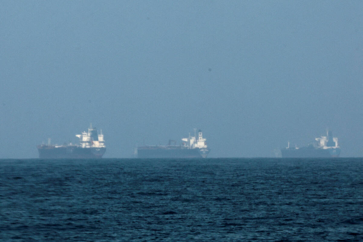 FILE PHOTO: Tankers are seen off the coast of Fujairah, as Iran vows to fire on ships transiting the Strait of Hormuz, amid the U.S.-Israel conflict with Iran, in Fujairah, United Arab Emirates, March 3, 2026. REUTERS/Amr Alfiky/File Photo
