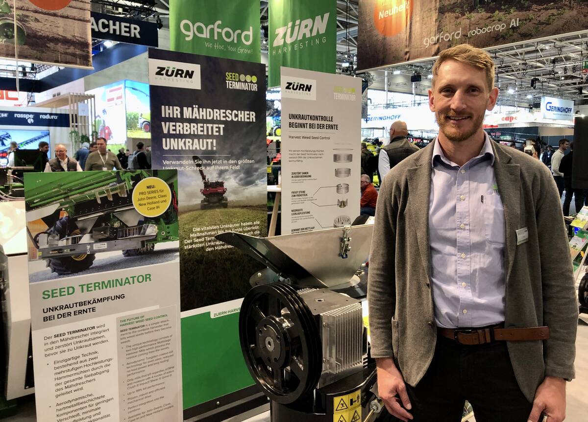 Nick Berry, founder and chief executive of Seed Terminator, stands at the Z&uuml;rn booth at Agritechnica 2025 in Hanover, Germany.