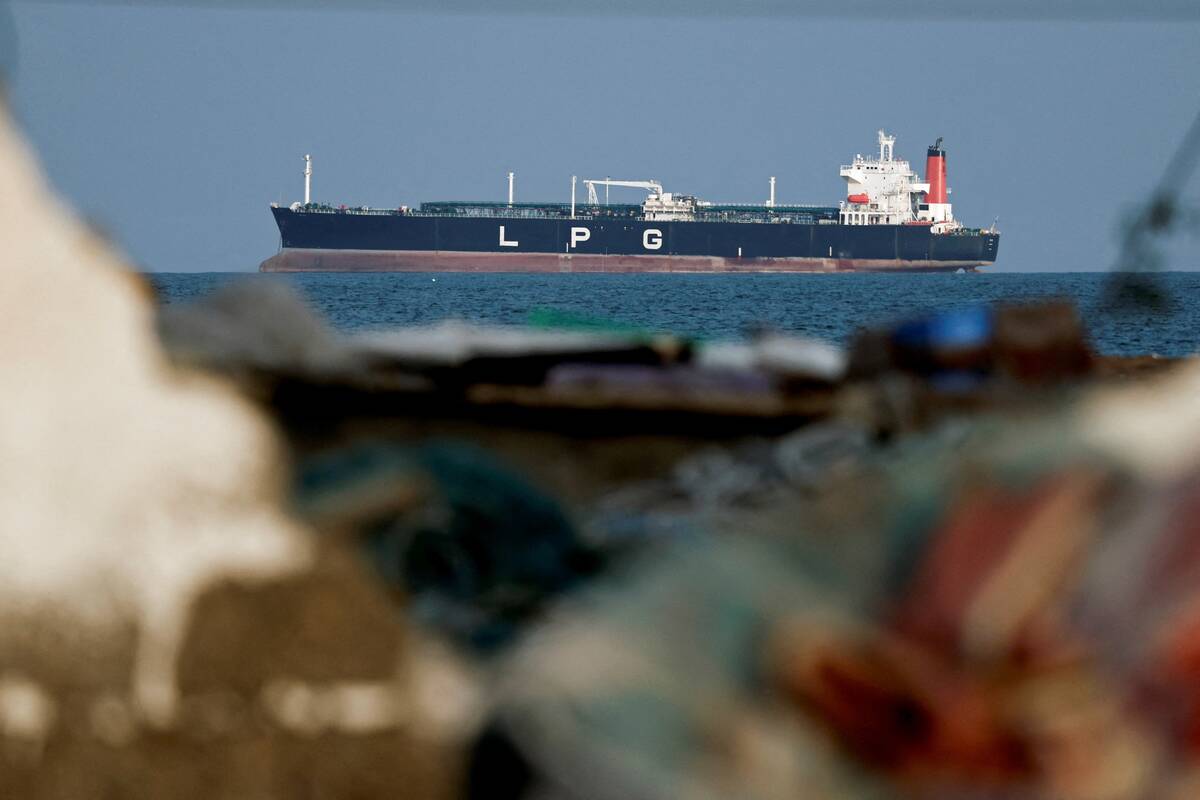 An LNG tanker sits at anchor off the coast of Shinas, Oman. The near closure of the Strait of Hormuz has disrupted global energy and fertilizer supplies as the U.S.-Israel war with Iran enters its third week. Photo: Reuters
