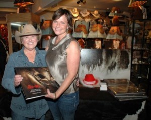 Photographer JoAnne Meeker, left and Diamond 7 Ranch manager Laura Laing at the launch of The Life is Art.