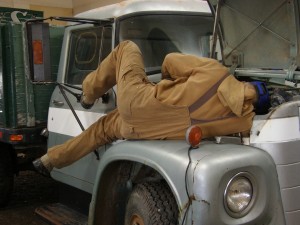 Repairing equipment sometimes requires getting into some very awkward positions.