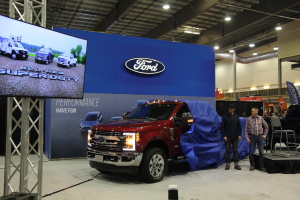 The cover is pulled off a new Ford Super duty during a debut event in Regina in November