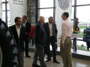 Robert Ratliff and Senior AGCO executives tour the Intivity Center at the company's Jackson, Minnesota, assembly plant at its grand opening