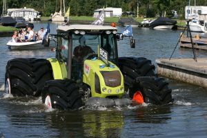 Fitted with Mitas' largest tires this Claas head out into the water in the Netherlands