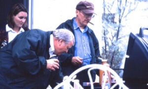 Sirski liked to barbecue. Above, Sirksi is armed with tongs as publisher Palmer Anderson adjusts BBQ burners. In the background is former Grainews writer Maggie Vankamp, now a senior editor with Country Guide in Ontario. And as I recall the steaks were great.