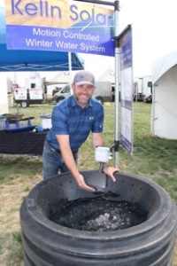Derek Verhelst with motion sensor waterer